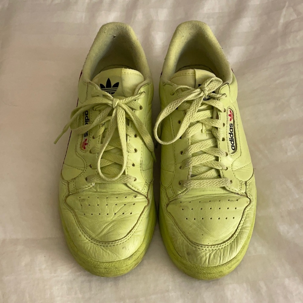 Neon yellow Adidas continentals